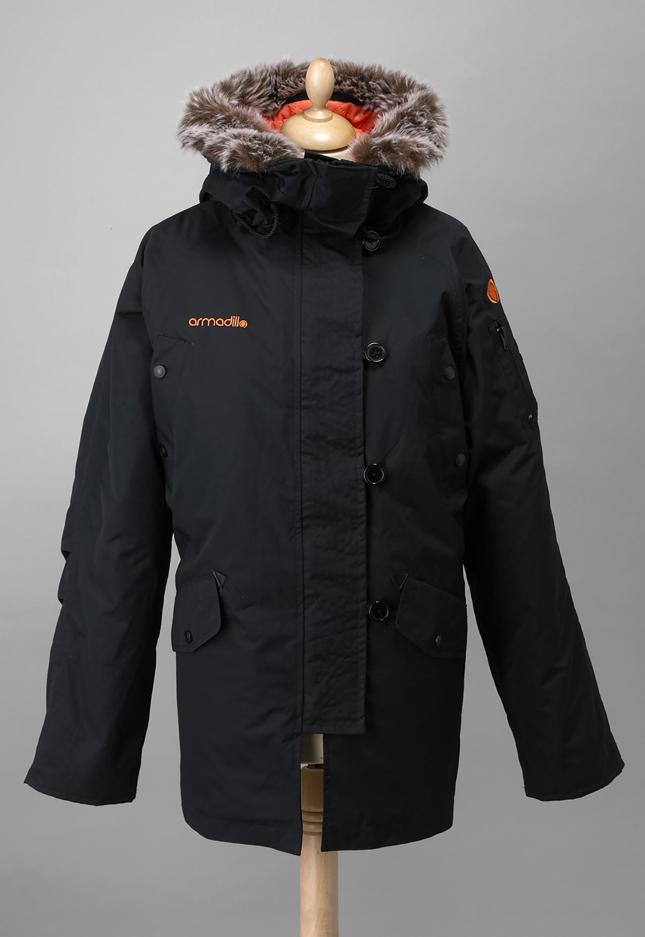<img src= ”fur_smalla.jpg” alt = “Ladies Parka Black” / >